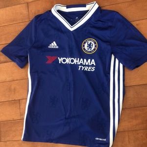 8 assorted kids soccer jerseys